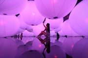 luminous-colored-spheres-by-team-lab-respond-to-human-touch-designboom-03
