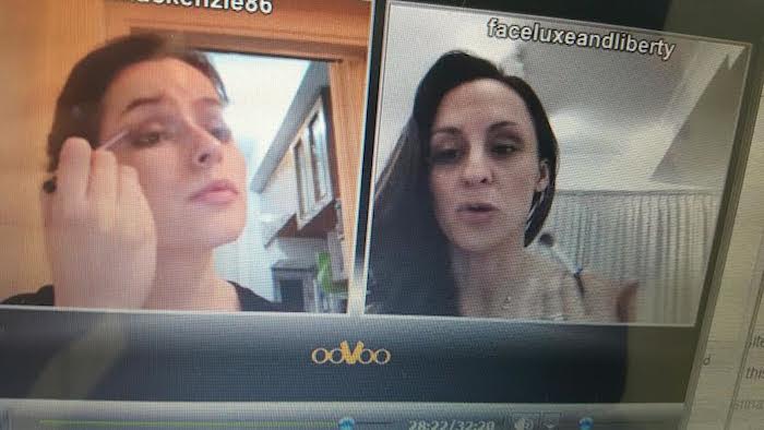 Contributor Aoife applying eye shadow while taking direction from Face Luxe and Liberty over Skype