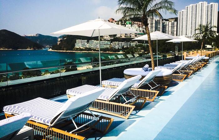 Deck chairs by a pool at Cabana Hong Kong