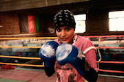Woman boxing in a Refugee film festival video