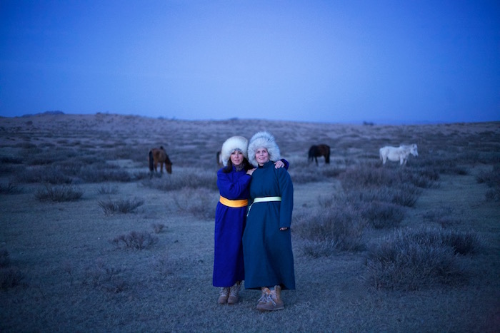 two friends in traditional mongolian dress 