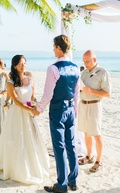 a couple saying their vowels on the beach in boracay