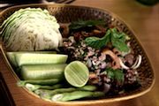 a bowl of korean noodles and mushrooms