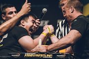 two men arm wrestling at Arnold classic asia