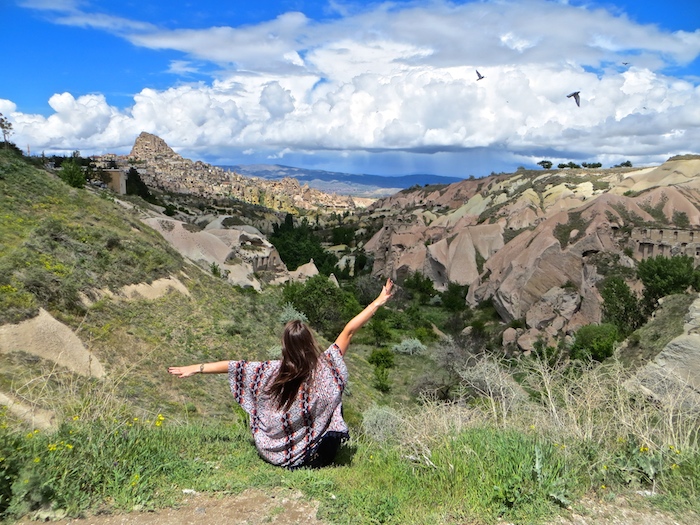 a girl in the mountains of cappadocia turkey