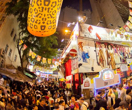 people partying on the streets of lan kwai fong in hong kong