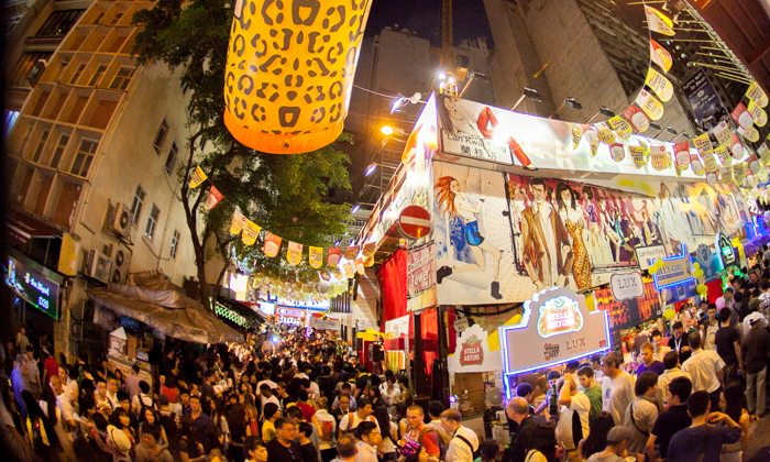people partying on the streets of lan kwai fong in hong kong