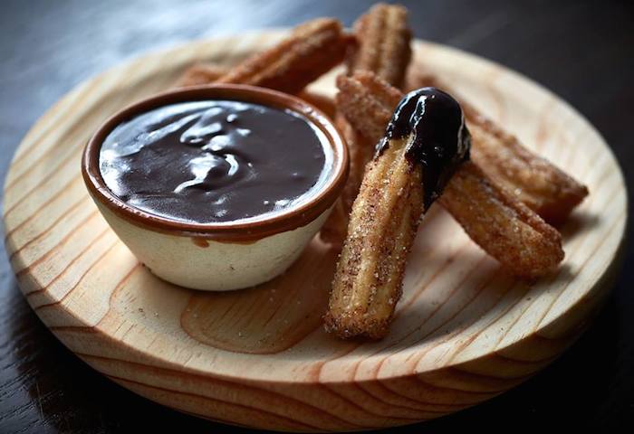 churros and chocolate sauce from ham & sherry