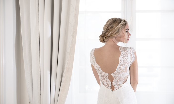 girl wearing a lace wedding dress