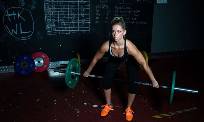 girl lifting weights