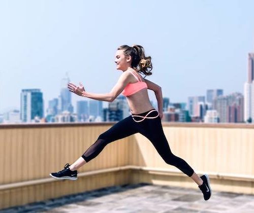 woman jumping in zarie dream leggings