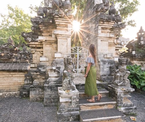 girl at a temple in indonesia
