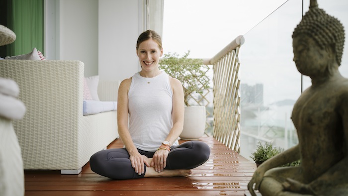 maura thompson sitting on her balcony