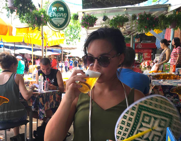 girl drinking beer in bangkok