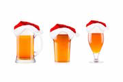 beer glasses with santa hats on