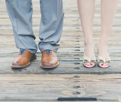 man and woman's shoes