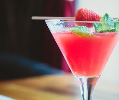 pink mocktail with a strawberry