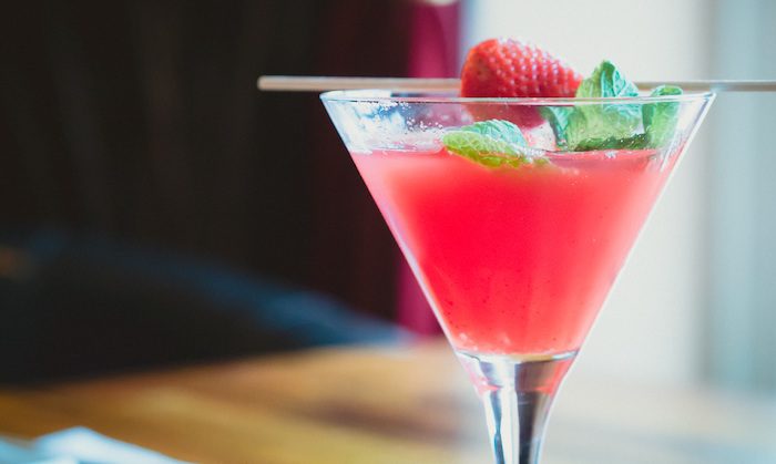 pink mocktail with a strawberry