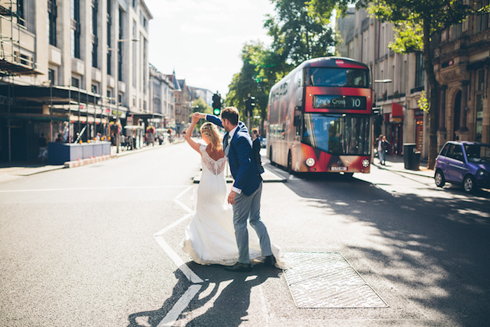 married couple dancing in the street in london
