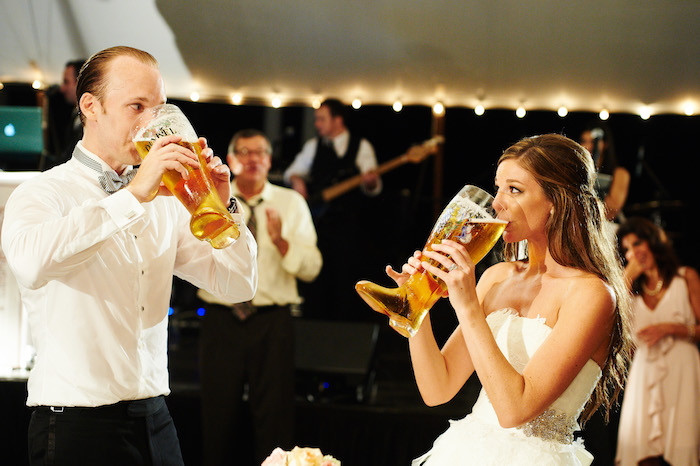 bride drinking from german beet boot