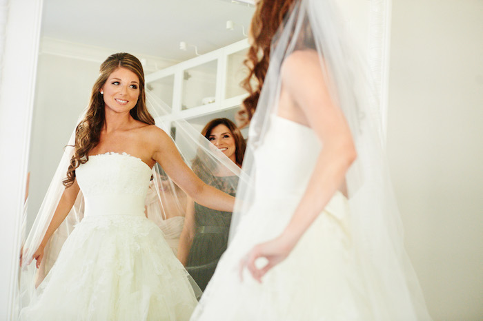 bride looking the mirror