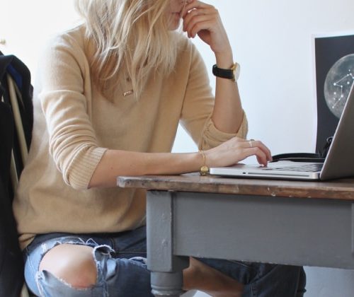woman sitting at her computer