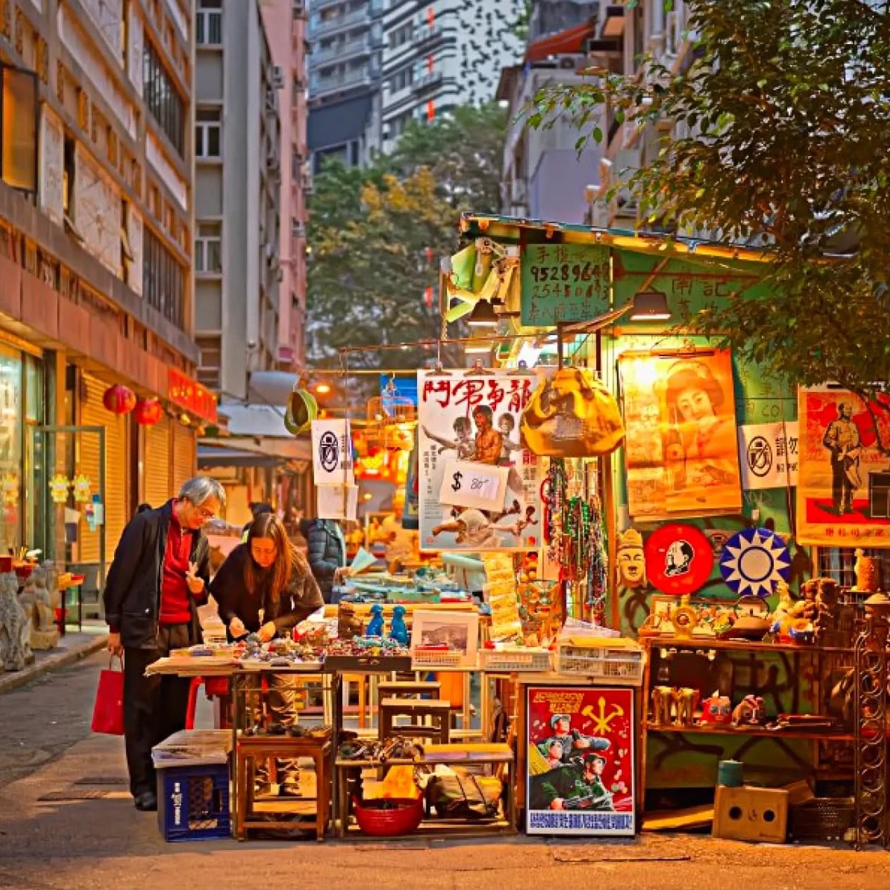 Vendor selling art prints and souvenirs at Cat Street, Upper Lascar Row, in Sheung Wan. 