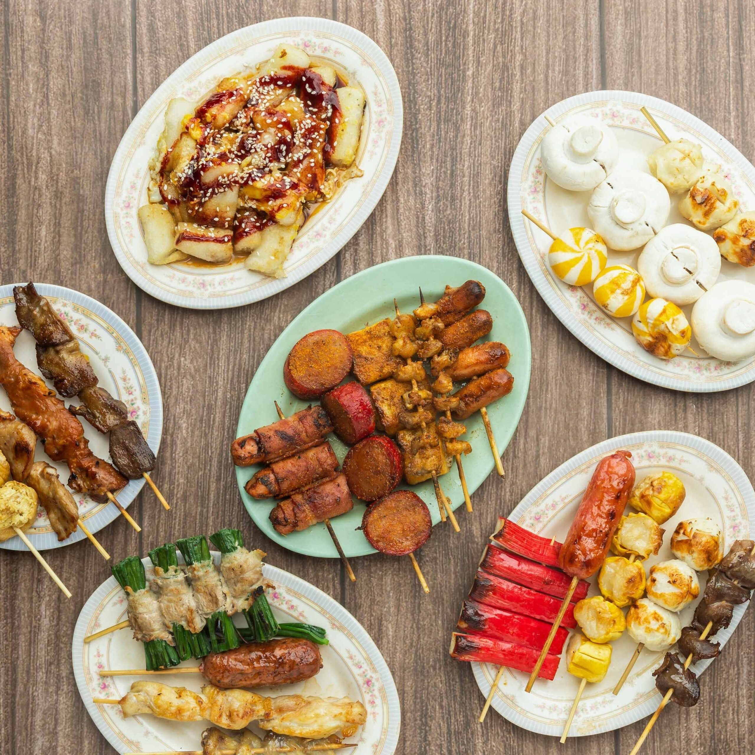 Barbecue skewers and local Hong Kong street food from a popular food stall near Polytechnic University campus.