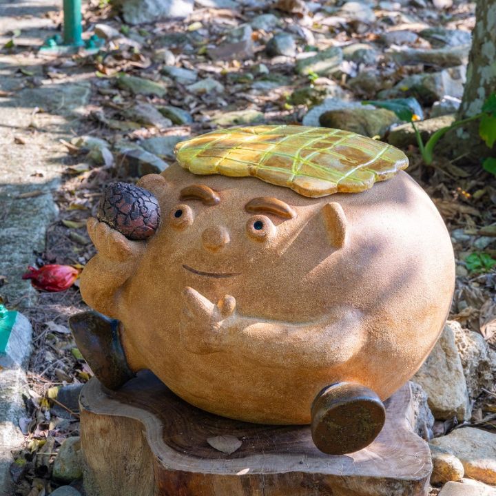 Sharp Island Sai Kung Hong Kong Geo Pineapple Bun cute statue showcasing a pineapple bun shaped rock