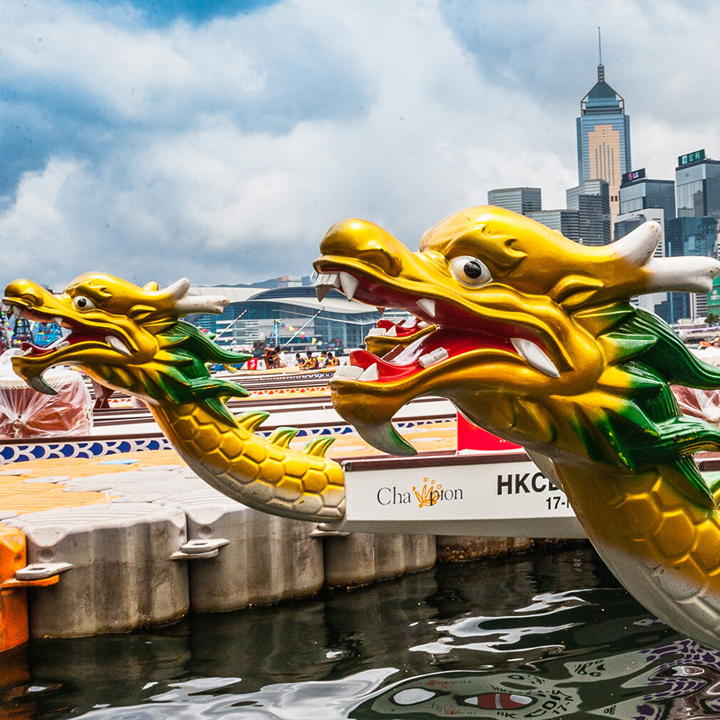 dragon boat festival origins history and traditions; why a dragon head on the boat hong kong china 