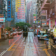 rainy street in hong kong with people carrying umbrellas