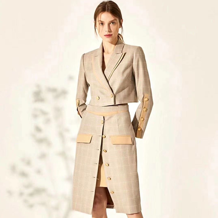 woman in bespoke suit tailored by ceciila lau, best wedding tailor in hong kong for wedding suits