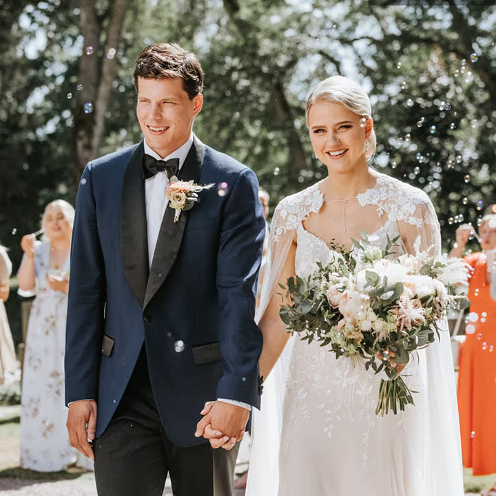 bride and groom couple wearing a tailored suit and dress, manning company wedding tailors in hong kong