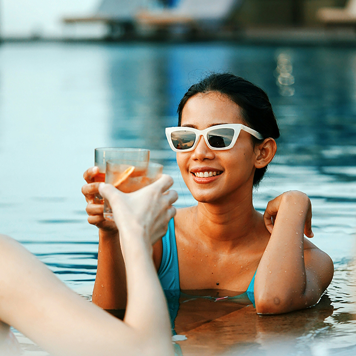woman at a pool party; Fiesta Caliente pool party at Soho House in July 2026