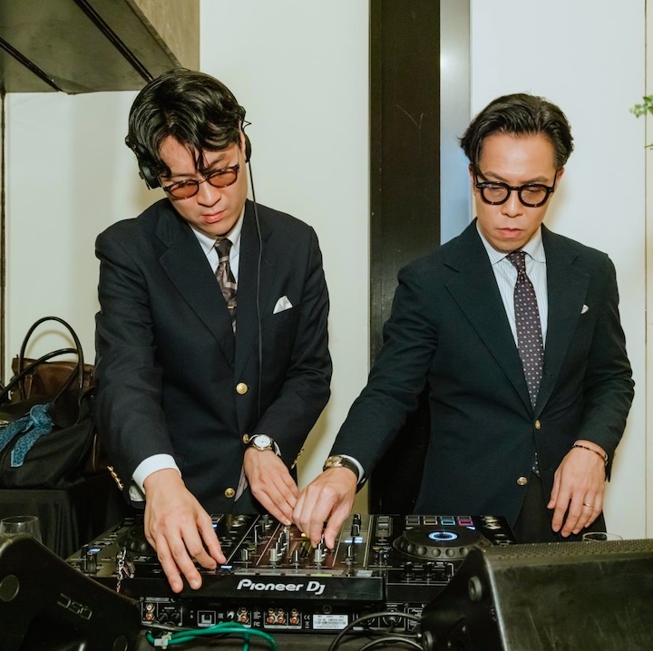 photograph of two asian men DJing in suits at th Hong Kong Palace Museum in August 2026