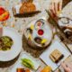 selection of dishes on a table from a birds-eye view from Louise Hong Kong's weekend brunch, available autumn 2026