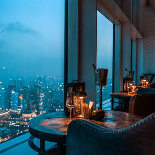 Window seats at MO Bar in Shenzhen offering panoramic city night views