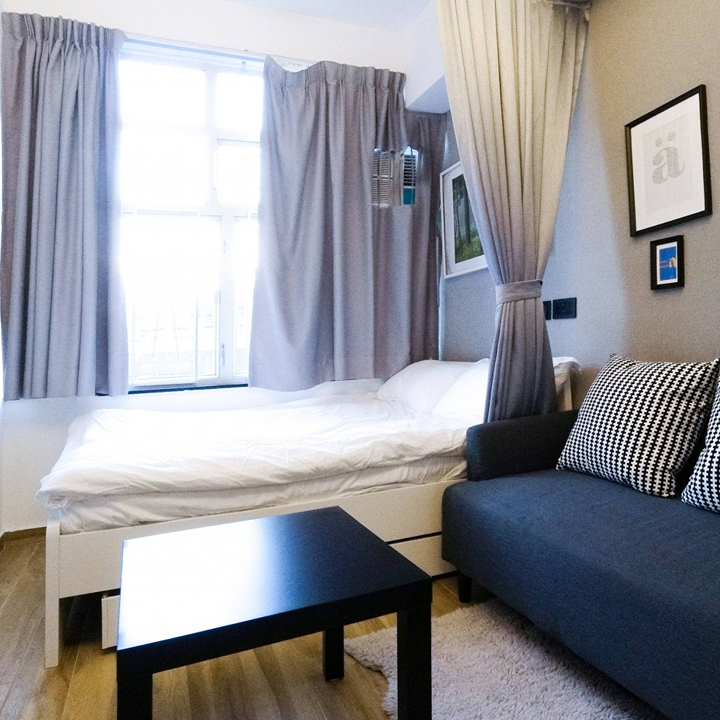 inside of a co-living bedroom in Owl Square Hong Kong, co living owl square, shared apartments