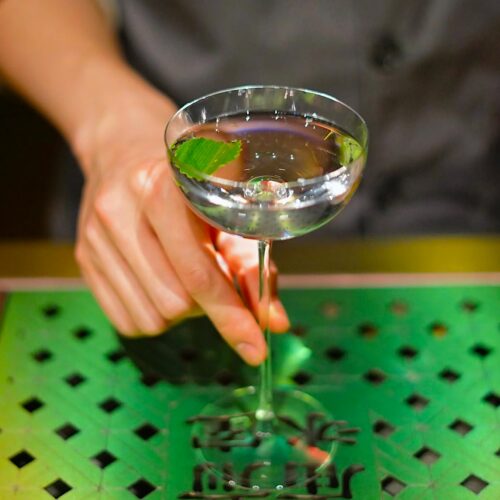 a martini being served at hope and sesame, a guangzhou bar named #1 bar in asia by asias 50 best bars in 2026