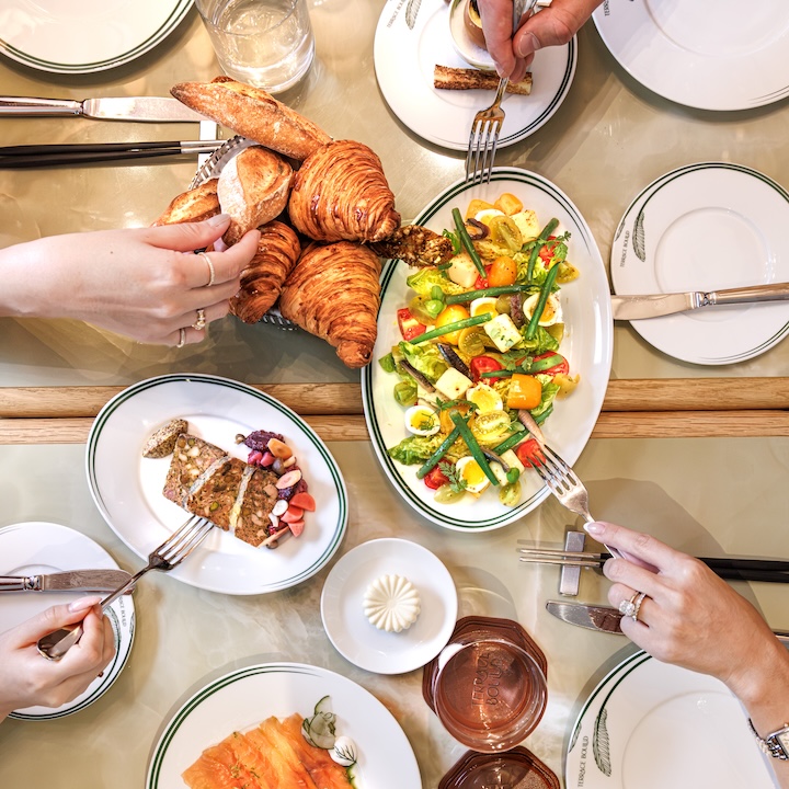 Lifestyle Photo from an aerial view of Terrace Boulud Brunch dishes