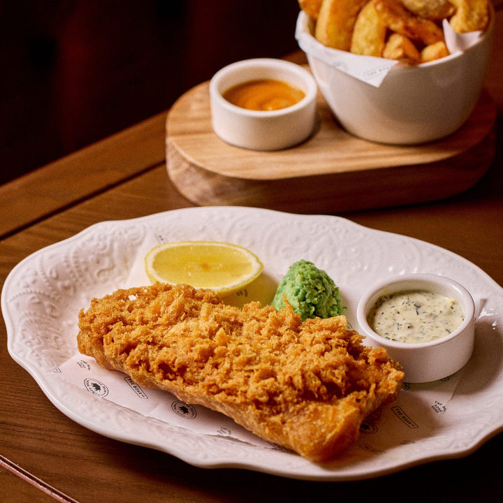 The Boar brings an authentic London pub experience to Soho. pictured here is their classic Fish and chips