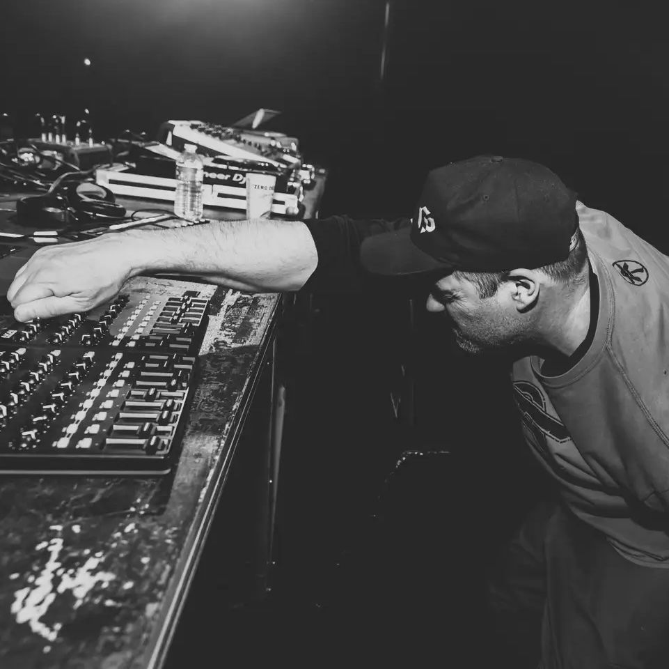 black and white image of 69db playing in a nightclub, a DJ coming to Hong Kong this weekend