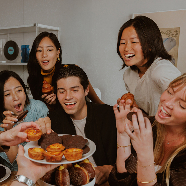 Group of friends enjoying catered food, fresh pastries, from Bakehouse Occasions in Hong Kong