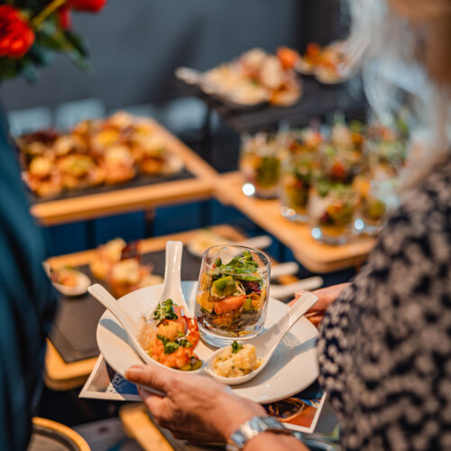 Plate of catered food in Hong Kong, variety of dishes from a catering company on the table, where to get the best party food delivery in HK