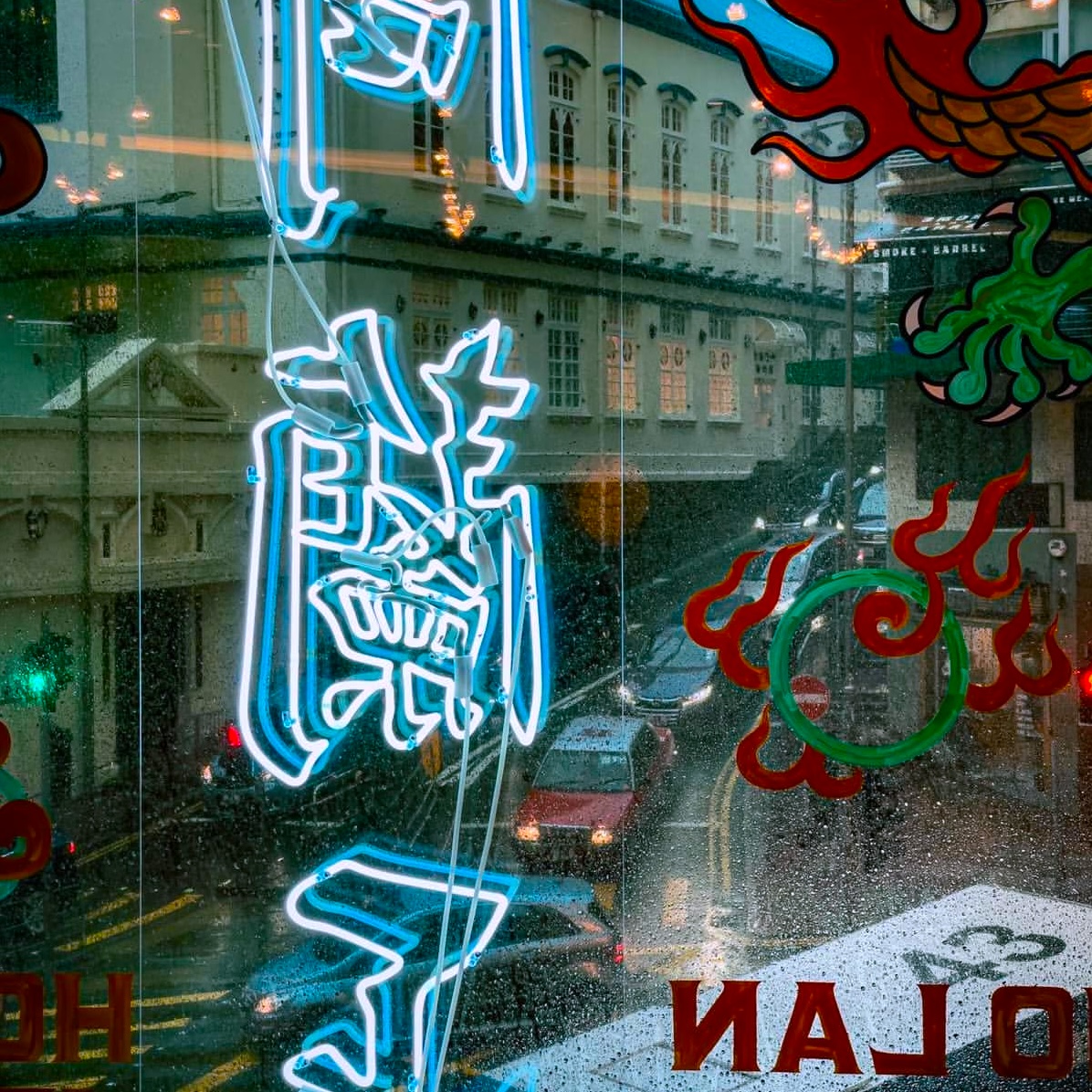 view from rainy window from ho lan jeng bar in lan kwai fung hong kong