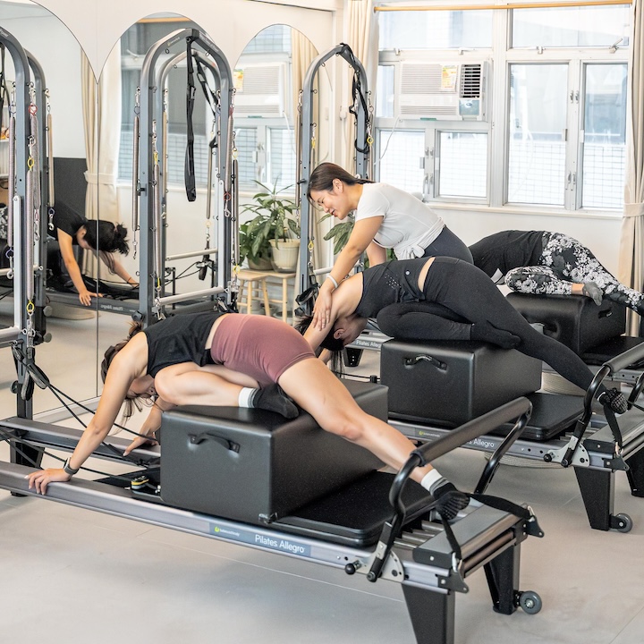photo of people doing Pilates on a reformer in Jesel Studio in wan chai, hong kong