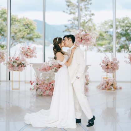 couple kissing at WM Hotel Hong Kong, Vignette Collection wedding in the chapel