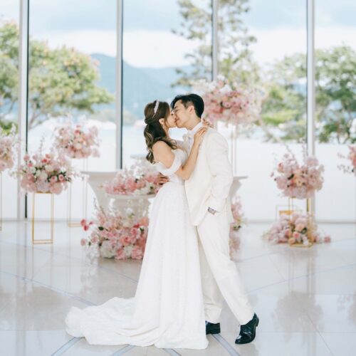couple kissing at WM Hotel Hong Kong, Vignette Collection wedding in the chapel